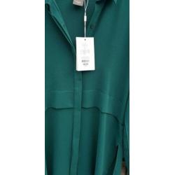 Dames tuniek van turquoise kleur