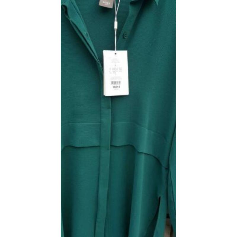 Dames tuniek van turquoise kleur