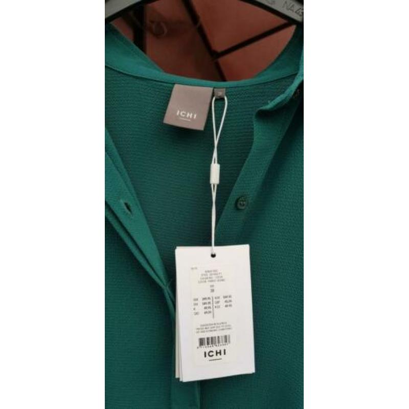 Dames tuniek van turquoise kleur