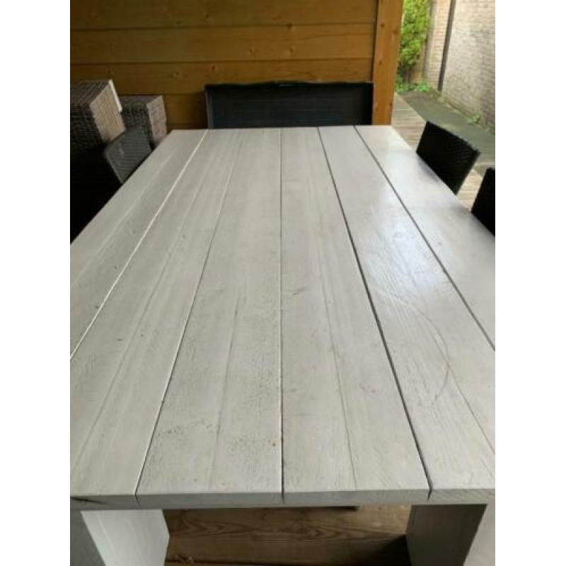 Houten tuintafel met 4 stoelen